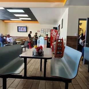 Lots of tables. Order at register before sitting.