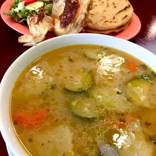 Chicken Soup. Bowl is broth and veggies. Chicken off to the side and grilled. Interesting take, me likes.