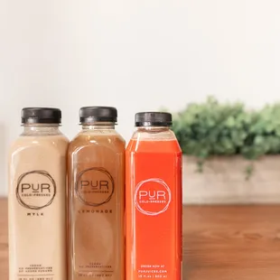 three bottles of juice