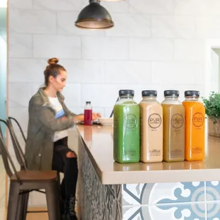 a woman sitting at a counter