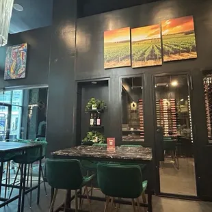 The view from the bar showing the member&apos;s lounge and the wine cellar. These are beautiful spaces!