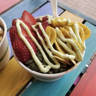 a bowl of fruit and cereal