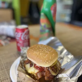 a cheeseburger and a soda