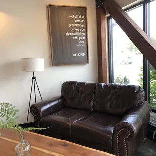  brown leather couch in a living room