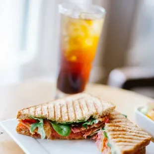 Southwest BLT: Hickory smoked bacon, cheddar cheese, avocado, tomatoes, lettuce, and our southwestern sauce pressed in our homem