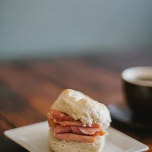 Country Ham Biscuit: Fresh hot biscuit with layers of shaved country ham