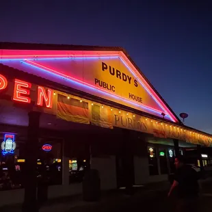 a neon sign for purdy&apos;s public house