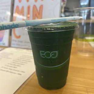 a smoothie in a plastic cup