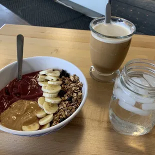 Açaí bowl with house made peanut butter, bananas and granola &amp; lavender coffee with oat milk