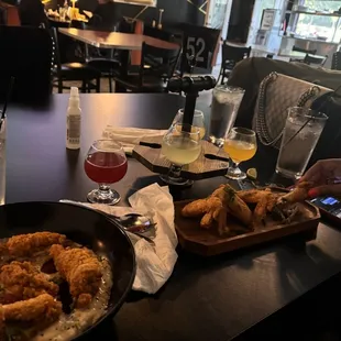 Catfish and grits, chicken wings, mimosas flights