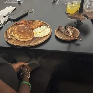 Pancake, eggs, hash brown, bacon and lamb chops