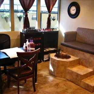 Manicure &amp; pedicure stations overlook the peaceful garden patio.