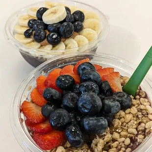 two bowls of fruit and granola