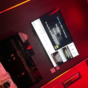 a tv screen and a guitar pedal