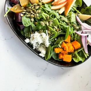 Beet The Odds 
Organic Pure Salad Blend, organic roasted beet, organic apple, red onion, roasted squash, local goat cheese