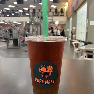 a cold beverage in a plastic cup