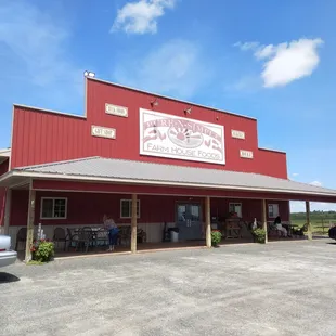 The outside of the restaurant and store.