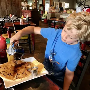 Special order Chocolate Chip Pancake for my nephew. The pancake is bigger than his head!