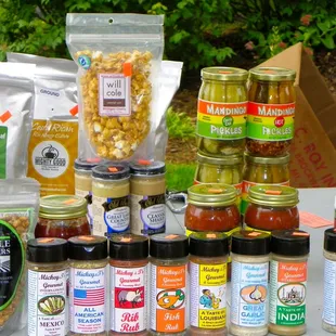 a table full of jars of food