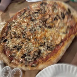 a pizza on a wooden table