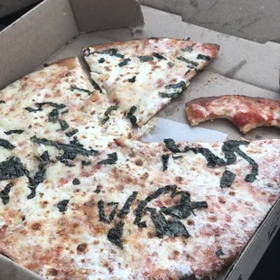 Gluten Free Pizza with basil and garlic toppings