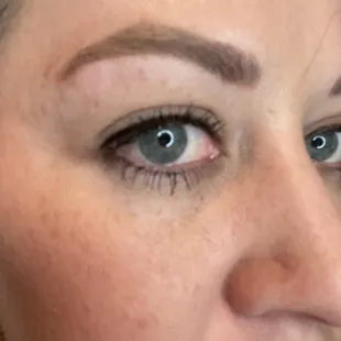 This is the left eye.   I have eye makeup, but have 0 makeup on or around my eyebrow in all pics.