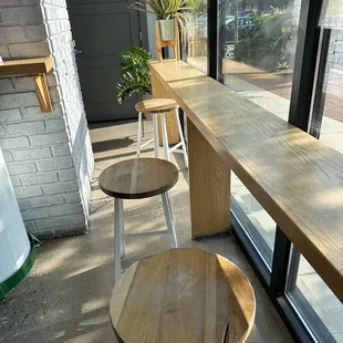 Seating at the bar overlooking the oitside