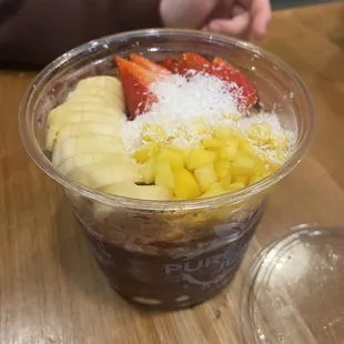 a close up of a fruit smoothie