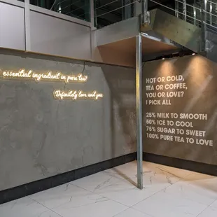 a wall with a quote on it