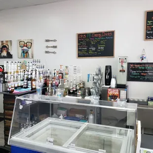 a counter with a variety of drinks