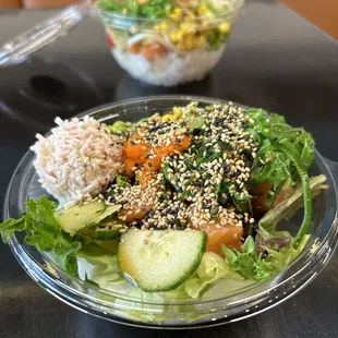 a bowl of salad and a bowl of rice