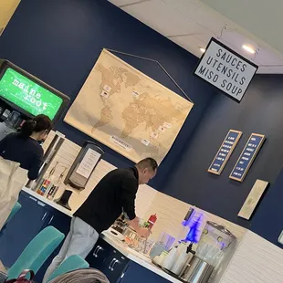 a man and a woman in a restaurant