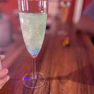 a glass of sparkling wine