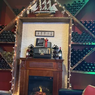 a fireplace in a wine cellar