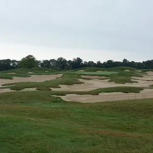 17th hole...100 yard par 3.  Sand city.