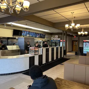 a man sitting at the counter