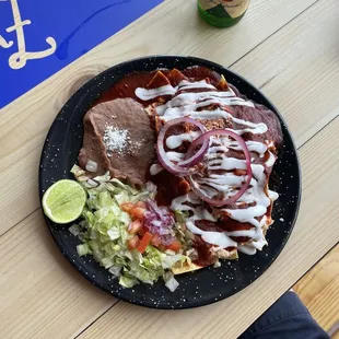 Chilaquiles with chicken and red sauce (chile colorado)