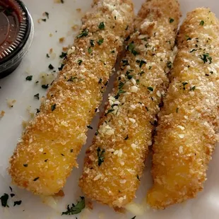 a plate of fried fish sticks