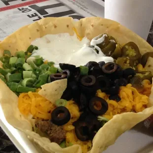 A WHOPPING 2 POUND+ TACO SALAD $7.75.  It's a basic version but good price/value.