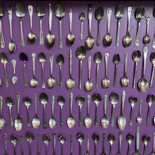 a wall of spoons