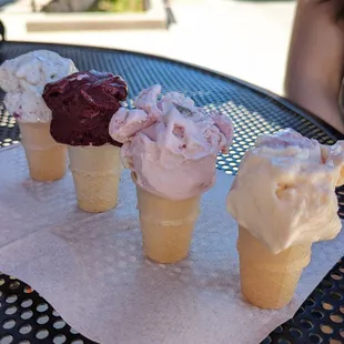 Ice cream mini flight on sugar cones.