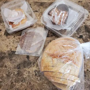 a loaf of bread wrapped in plastic