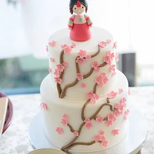 &quot;1st Birthday Cake&quot; with matching cherry blossoms &amp; traditional Korean girl cake topper
  
  -Photo by Sugarbaby Photography