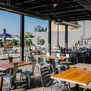 outdoor dining area with tables and chairs