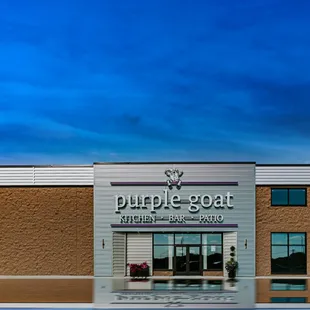 the outside of a building with a blue sky