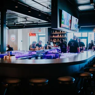 people sitting at a bar