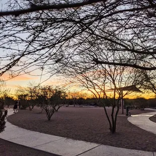 Park at sunset on a Saturday