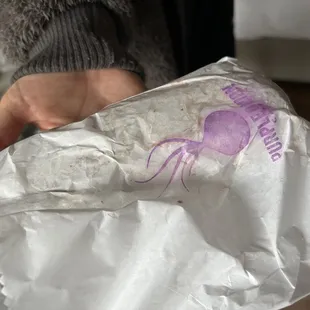 Soaked sloppy burrito. They tried to wipe it  clean!