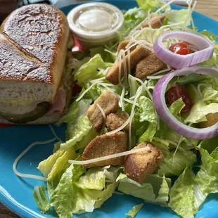 Cuban sandwich and Caesar salad