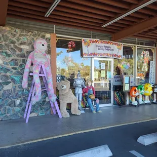 a teddy bear on a ladder